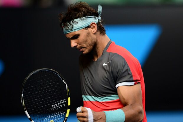 Rafael Nadal is focused during an intense tennis match, HD Desktop Wallpaper