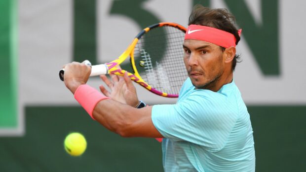 Rafael Nadal prepares to hit a backhand during a tennis match, 2K Desktop Wallpaper