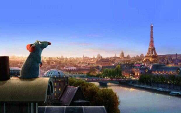 Ratatouille character looking over Paris cityscape at sunset