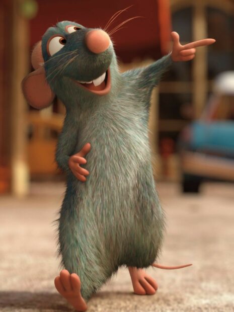 Animated rat character from Ratatouille standing and pointing with a joyful expression