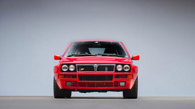 A red Lancia car is parked with a clear grey background, HD Desktop Wallpaper