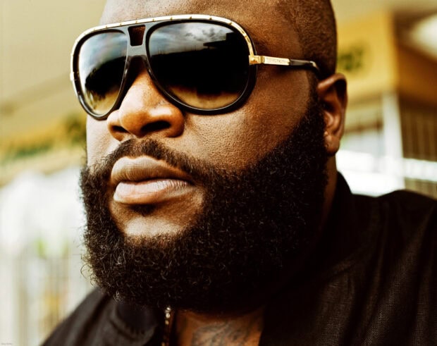 A close up of Rick Ross wearing sunglasses and a thick beard, 2K Desktop Wallpaper