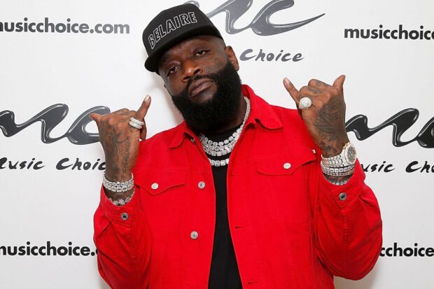 Rick Ross wearing a red jacket and black cap posing with hand signs, HD Desktop Wallpaper