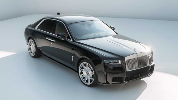 A black Rolls Royce Ghost luxury sedan parked in a modern setting, HD Desktop Wallpaper