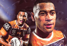 Jamayne Isaako is shown playing rugby league while holding the ball and running on the field, HD Desktop Wallpaper