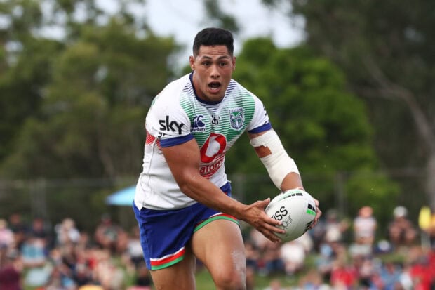 A rugby league player prepares to pass the ball during a match, HD Desktop Wallpaper