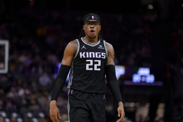 Basketball player in Sacramento Kings jersey number 22 on the court during a game