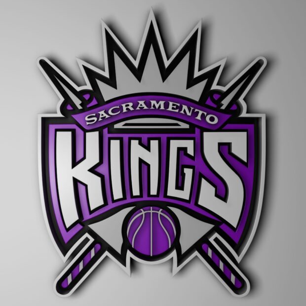 The Sacramento Kings logo in purple and gray colors with a basketball design on a gray background