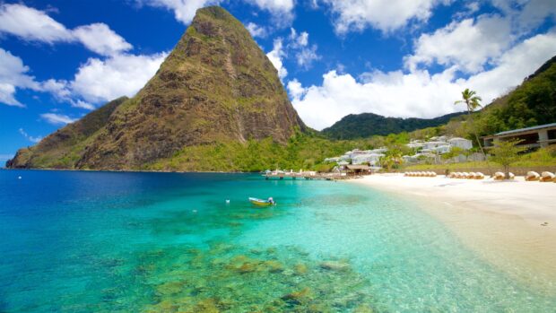 Clear turquoise waters and a rocky mountain landscape in Saint Lucia