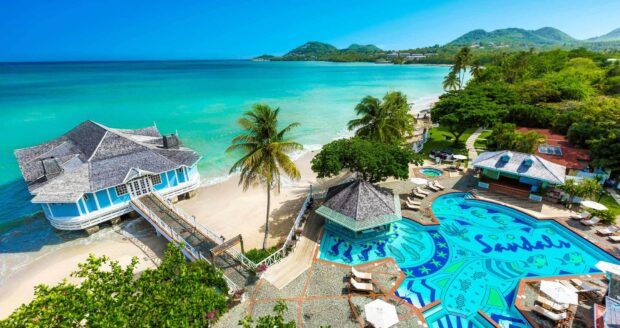 Tropical Saint Lucia scene with coastal resort and clear turquoise sea