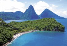 Beautiful lush Saint Lucia landscape with blue sea and mountainous terrain