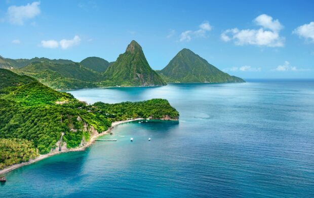 Lush green hills and blue ocean in Saint Lucia landscape
