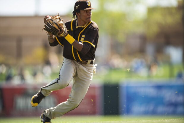 A San Diego Padres player is pitching the baseball during a game, 2K Desktop Wallpaper