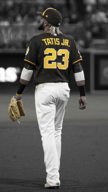 A San Diego Padres player wearing number 23 walks on the field holding a glove, 2K Phone Wallpaper