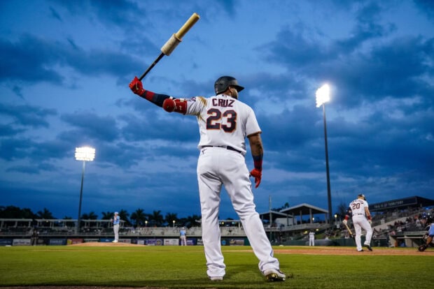 A San Diego Padres player stands at home plate holding a bat under the evening sky, 2K Desktop Wallpaper