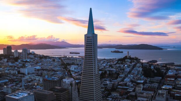 The iconic San Francisco skyline with the Transamerica Pyramid during sunset showcasing cityscape and bay waters