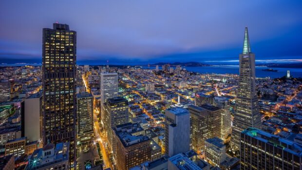 San Francisco skyline with illuminated buildings and city lights at dusk
