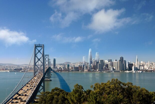 San Francisco skyline with the Bay Bridge and cityscape under a clear blue sky