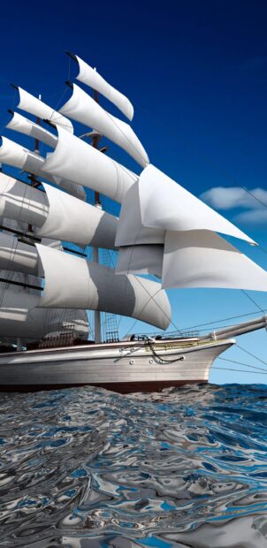White sails of a schooner ship gliding over reflective ocean water under a clear blue sky