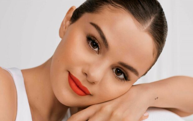 Selena Gomez wallpapers showing a close up of her face with red lipstick, 2K Desktop Wallpaper