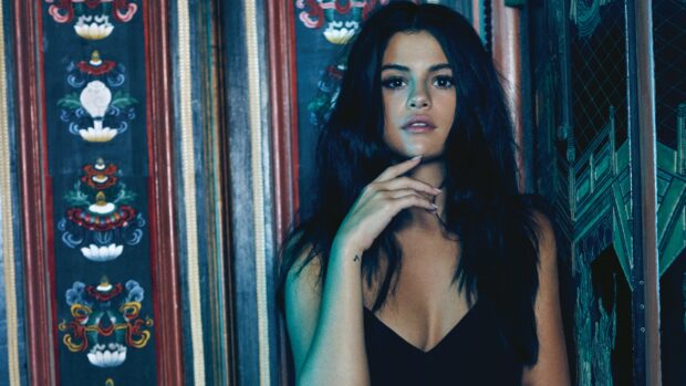 Selena Gomez Wallpapers show her thoughtful expression with patterned background, 4K Desktop Wallpaper