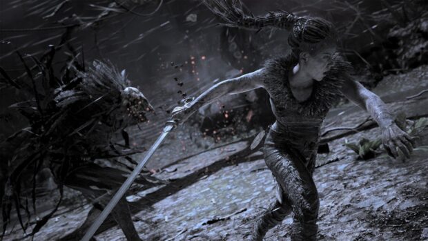 Senua wields a sword battling shadow creatures in a dark forest scene from Hellblade HD Desktop Wallpaper