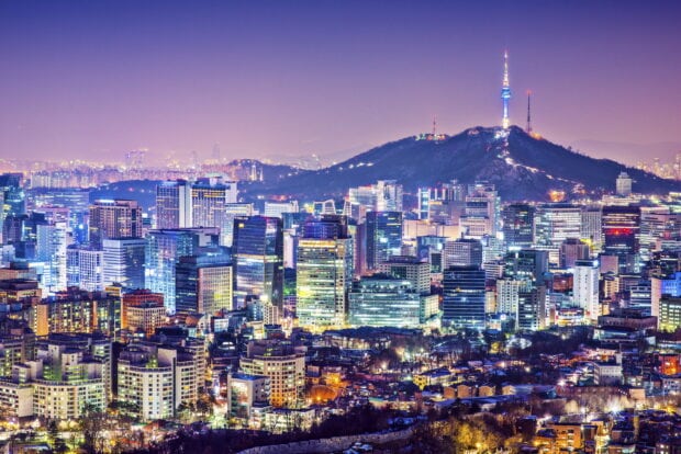 Night view of Seoul Korea cityscape with Namsan Tower illuminated on the hill