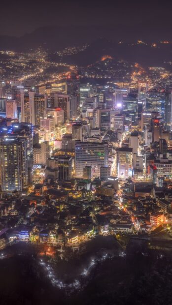 Nighttime cityscape of Seoul Korea with illuminated streets and buildings