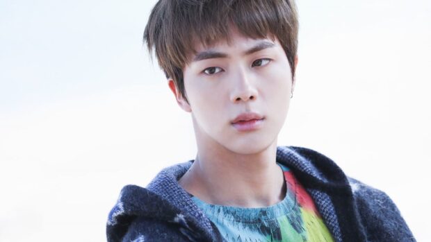 Jin BTS wallpapers show him looking thoughtful against a bright background, HD Desktop Wallpaper