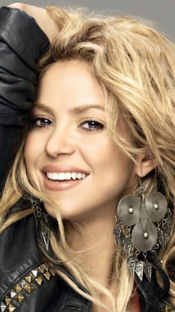 A close up portrait of Shakira with curly hair and large earrings, HD Phone Wallpaper