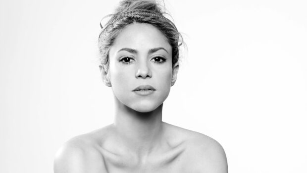 A close up portrait of Shakira with a neutral expression in black and white, 4K Desktop Wallpaper