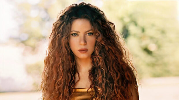 A close up portrait of Shakira with long curly hair and intense eyes, 4K Desktop Wallpaper