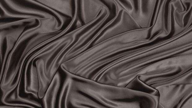 Smooth black silk fabric with gentle folds, 2K Desktop Wallpaper