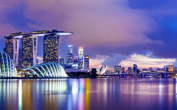 Modern Singapore skyline featuring iconic Marina Bay Sands and cityscape at dusk