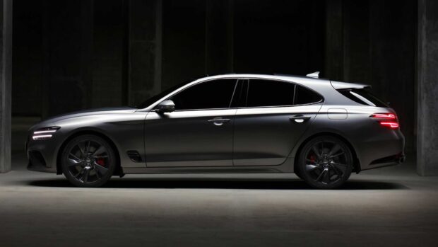 A sleek Genesis car is shown from the side in a dimly lit space highlighting its design, HD Desktop Wallpaper
