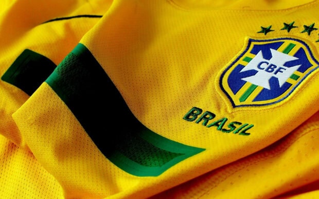 Close up of Brazil soccer jersey with CBF emblem and green stripe details