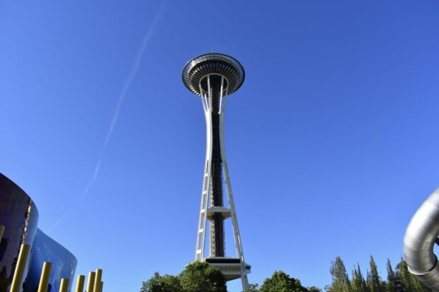 A clear blue sky with Space Needle structure standing tall in Seattle