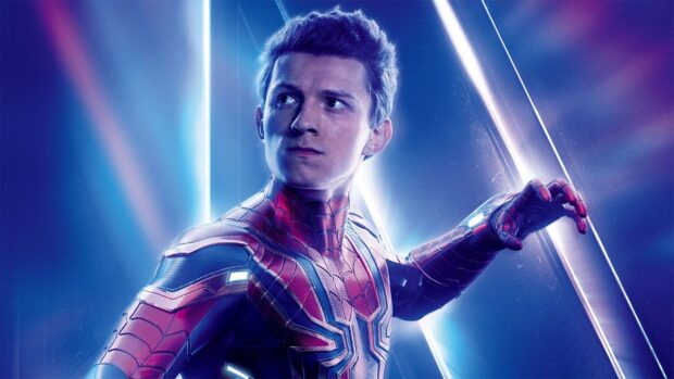 Tom Holland as Spider Man in a dynamic pose with glowing suit details, HD Desktop Wallpaper