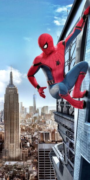 Spider Man Tom Holland is scaling the side of a tall building overlooking the city skyline, HD Phone Wallpaper