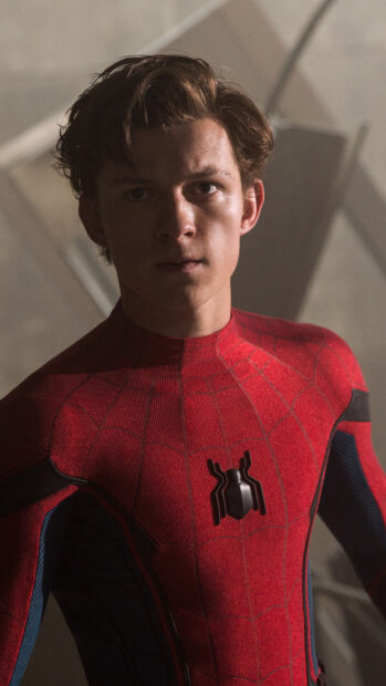 Spider Man Tom Holland looks serious in his suit with detailed web patterns, 4K Mobile Wallpaper