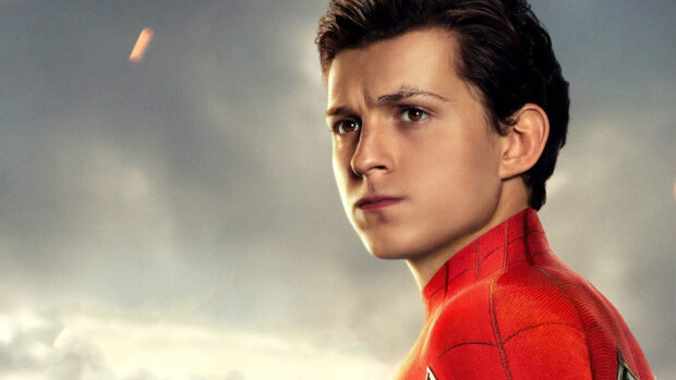 A close up of Spider Man Tom Holland looking serious in a red suit, 4K Desktop Wallpaper