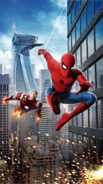 Spider Man Tom Holland is swinging through the city alongside Iron Man in an intense battle scene, 2K Mobile Wallpaper