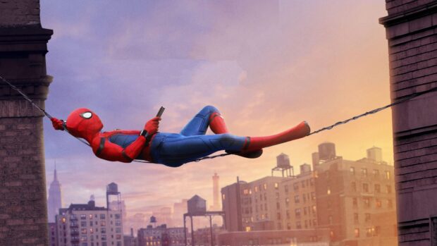 Spider Man Tom Holland swinging on web with city skyline at sunset, HD Desktop Wallpaper