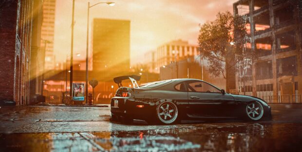 Modified sports car parked on wet city street during sunset.