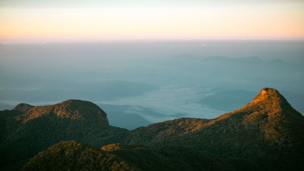 A serene mountain landscape in Sri Lanka bathed in morning light, 4K Desktop Wallpaper