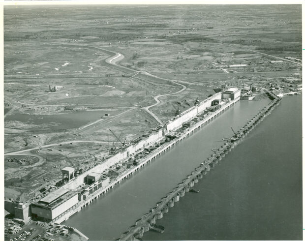 Aerial view of St Lawrence River dam construction site and surrounding landscape
