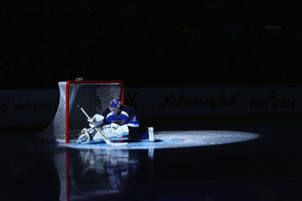 The St Louis Blues goalie prepares to block a shot during a hockey game, 2K Desktop Wallpaper