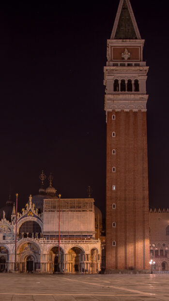 The St Marks Basilica is illuminated with the bell tower standing tall under the night sky, HD Mobile Wallpaper
