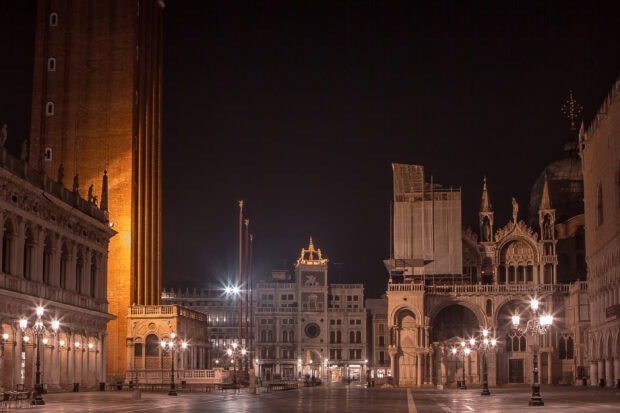 The historic St Marks Square is beautifully illuminated under the night sky, 2K Desktop Wallpaper