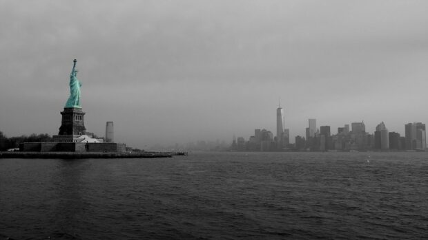 The Statue of Liberty stands tall with the New York City skyline in the background, HD Desktop Wallpaper